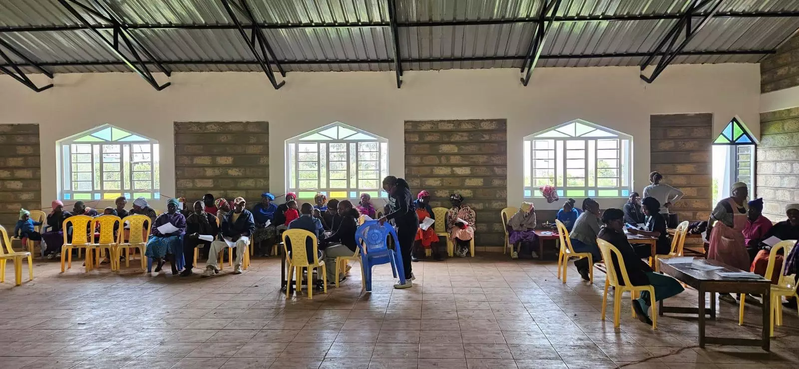 Young people gathered during a Matigari outreach visit