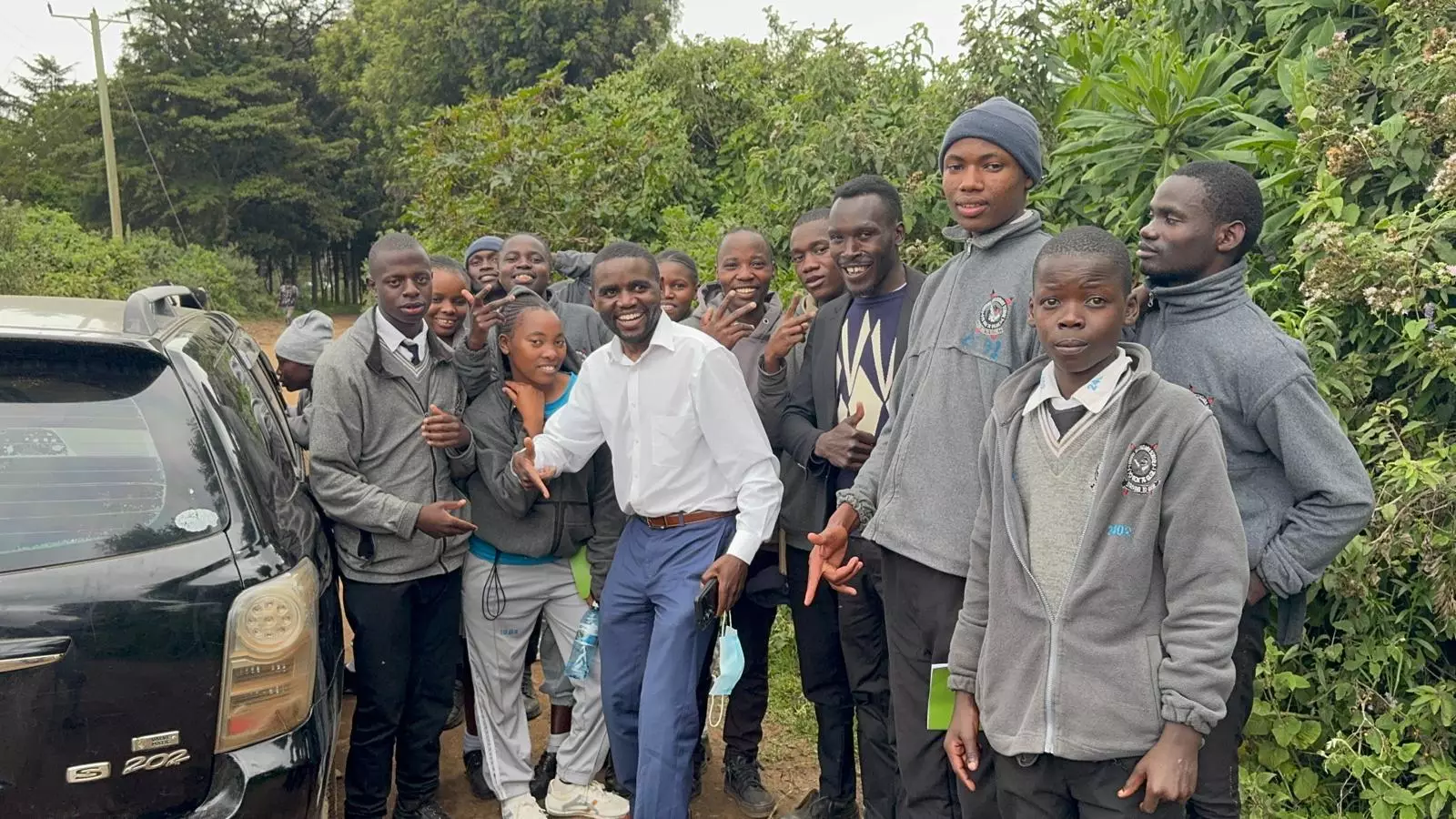 Students and community leaders during outreach